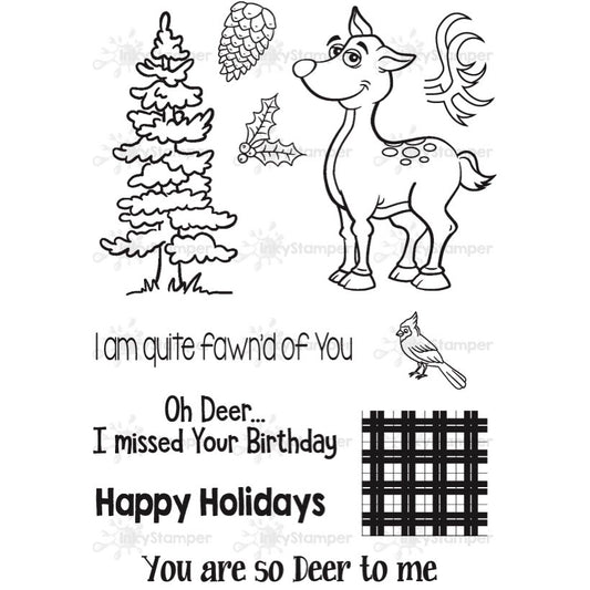 Set of clear stamps with a deer, tree, and text on a white background