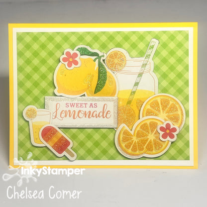 Card with lemon and orange-themed design on a green checkered background, Part of InkyStamper SMC Saturday Morning Crafting