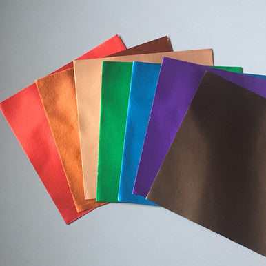 7 Luxurious Colors of Metallic Paper with Gold on the back of every piece.  6" x 6"
