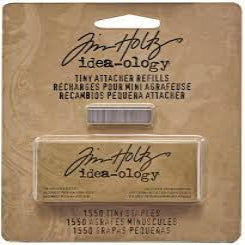 Tim Holtz Idea-ology tin attachment packaging on brown background staples